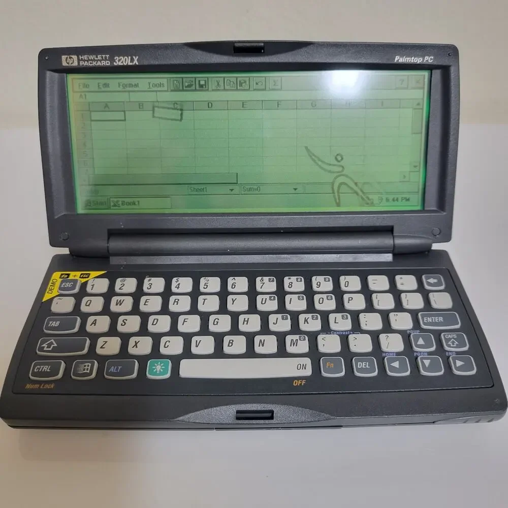 RARE VINTAGE 1997 HP 320LX PDA Palmtop Handheld Notebook PC WITH DOCK & CHARGER